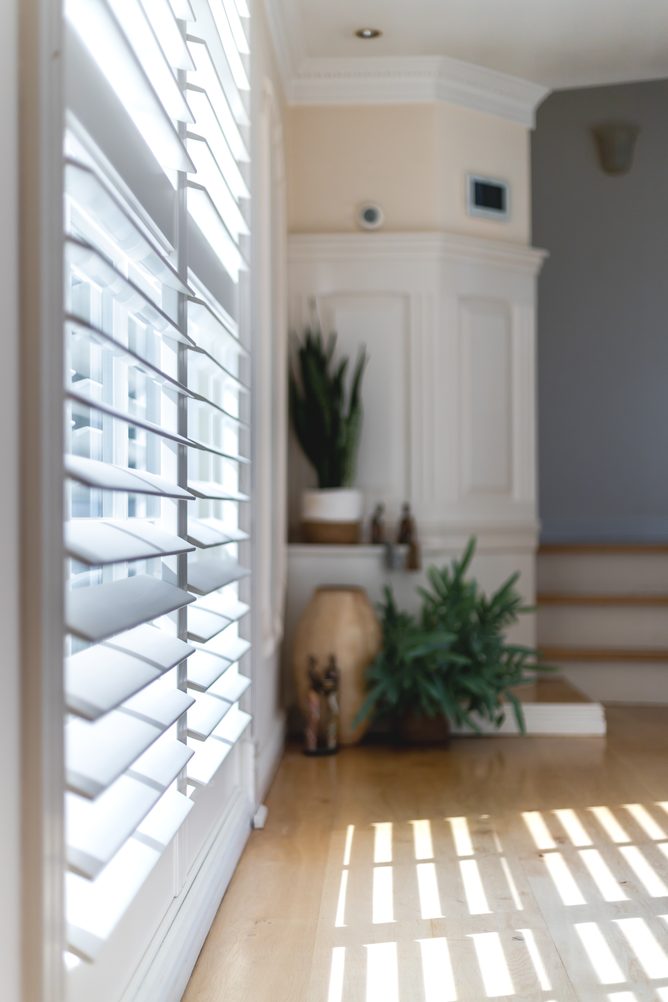 Plantation shutters in a hallway