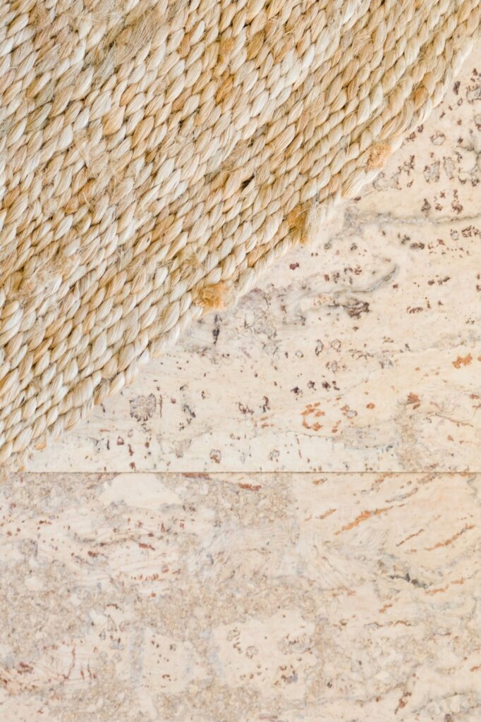 A close view of a cork floor showing the natural grain and the colour variation between tiles