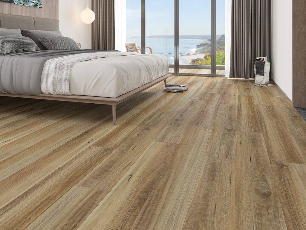 Long, wide timber-look hybrid planks running through a bedroom towards a window